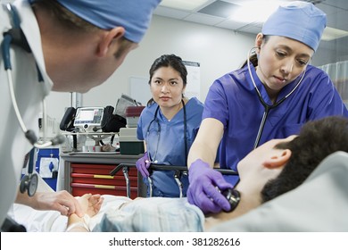 Patient And Doctors In The Emergency Room