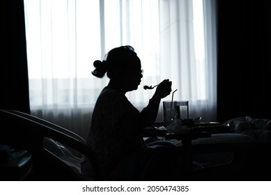 Patient Eating Hospital Food In The Bed