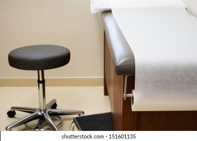 Patient Examination Table In A Doctors Office.