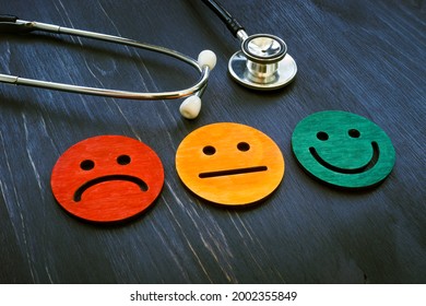 Patient Experience Concept. Stethoscope And Smiled Faces For Hospital Consumer Assessment.