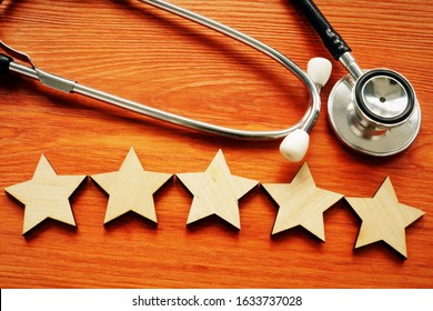 Patient Experience And Satisfaction Concept. Stethoscope And Five Stars.