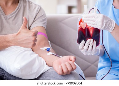 Patient Getting Blood Transfusion In Hospital Clinic