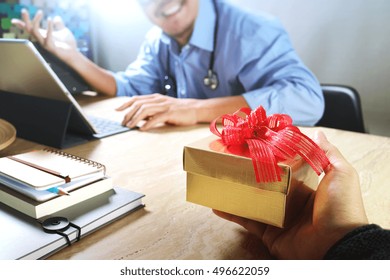 Patient Hand Or Team Giving A Gift To A Surprised Medical Doctor In Hospital Office,filter Film Effect