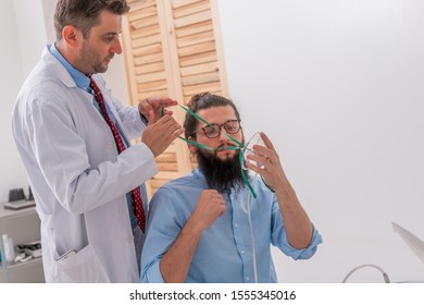 Patient Hipster Having An Asthma Attack At The Doctors Office