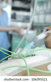 patient in the ICU. Visible Endotracheal tube  of ventilator. Photos.