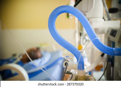 patient in the ICU. Visible Endotracheal tube of ventilator. Photos.