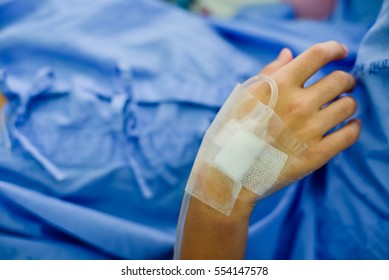 Patient With  Intravenous Line On Hand