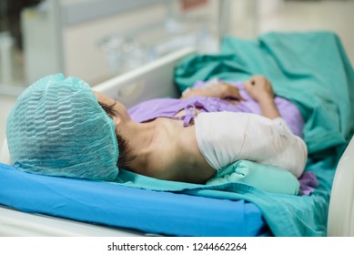 Patient On Bed Post Operation In Hospital.