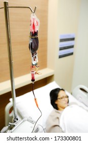 Patient On Blood Transfusion Operation In Hospital