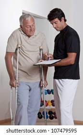 Patient On Crutches Discusses His Progress.