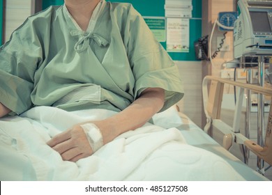 Patient On The Hospital Bed. Sick Person Stay In Hospital In Bad Mood. Vintage Tone