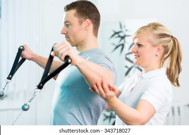 Patient at the physiotherapy doing physical exercises with Bowden cable