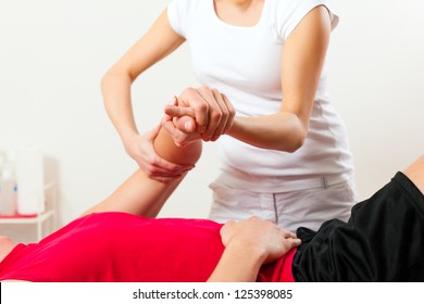 Patient At The Physiotherapy Doing Physical Therapy Exercises With His Therapist