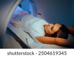 
Patient Ready for an Abdominal CT Scan Evaluation 
Woman undergoing for medical scan procedure in the hospital
