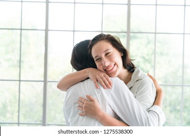 Patient stood Hugging the Doctor with Joy After the Doctor Informed the Good News. Successful Treatment, Happy Day Concepts - Powered by Shutterstock