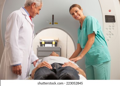 Patient Undergoing MRI At Open Scanner Machine.