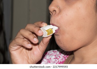 Patient Using Dry Powder Inhaler Or DPI Device For Deliver Medication To The Lungs In The Form Of A Dry Powder To Treat Respiratory Diseases Such As Asthma, Bronchitis, Emphysema And COPD. 