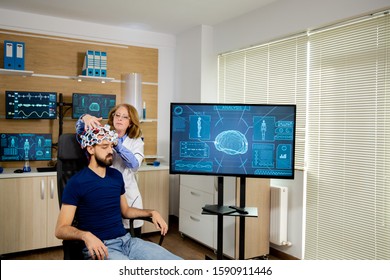 Patient Who Undergoes A Brain Scan Procedure In A Neurological Center. Modern Lab