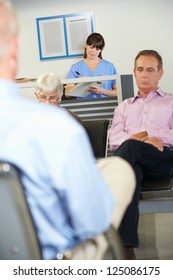 Patients In Doctor's Waiting Room