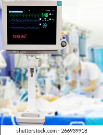 Patients Monitor In Pediatric Intensive Care Unit With Nurse On Background