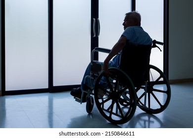 Patients sitting on wheelchairs have depression. Man patient in a wheelchair is discouraged