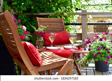 Patio Deck And Garden Setting For Secluded Casual Dining In Home Backyard For Relaxing Staycation Evening On Warm Summer Day