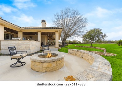 A patio with a firepit