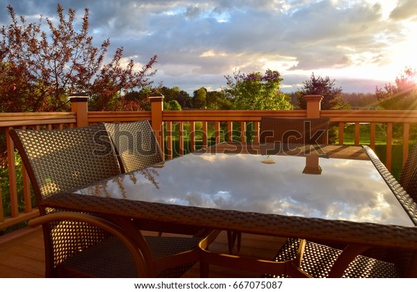 Patio Furniture Sunset Reflection Stock Photo Edit Now 667075087