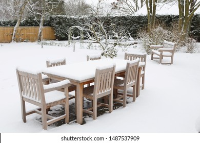 Patio Garden Furniture Covered With Snow In Winter, UK