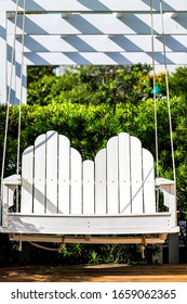 Patio Pergola White Wooden Hanging Swing In Outdoor Green Garden In Backyard Porch Of Home Hanging Furniture Nobody In Florida Tropical House