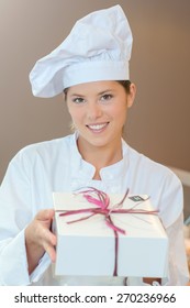 Patisserie Chef Holding A Gift Box