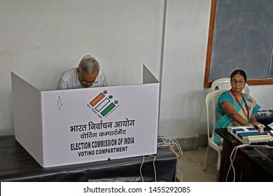 Patna, Bihar, India - May 19, 2019: A Voter Casts His Vote In The Secret Voting Compartment Inside The Voting Booth.