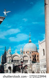 The Patriarchal Cathedral Basilica Of Saint Mark Is The Iconic Church Of The Roman Catholic Archdiocese With Towers, Arches, Lion And Angel Figures, Golden Statues & A Museum In Venice, Veneto, Italy