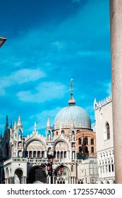 The Patriarchal Cathedral Basilica Of Saint Mark Is The Iconic Church Of The Roman Catholic Archdiocese With Towers, Arches, Lion And Angel Figures, Golden Statues & A Museum In Venice, Veneto, Italy