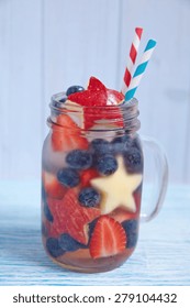 Patriotic Drink Cocktail With Strawberry, Blueberry And Apple