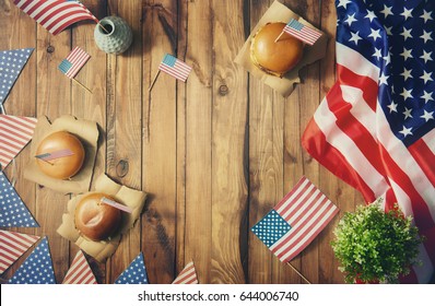 Patriotic holiday. USA are celebrate 4th of July. Top view with American flag on the table.