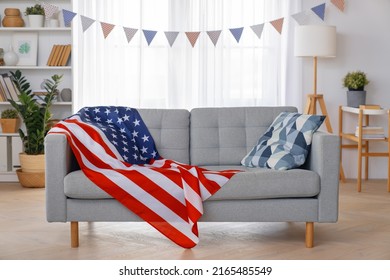 Patriotic holiday. The USA are celebrating 4th of July. American flag in the room.