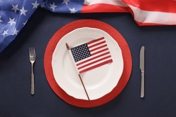 Patriotic Table Setting With American Flag And Decoration On Blue Background. Independence Day. Happy Memorial Day.  Top View.