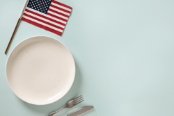 Patriotic Table Setting With American Flag On Blue Background. Independence Day. Top View. Copy Space.