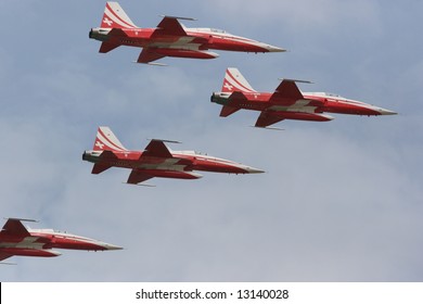 Patrouille Suisse flying in formation at an airshow