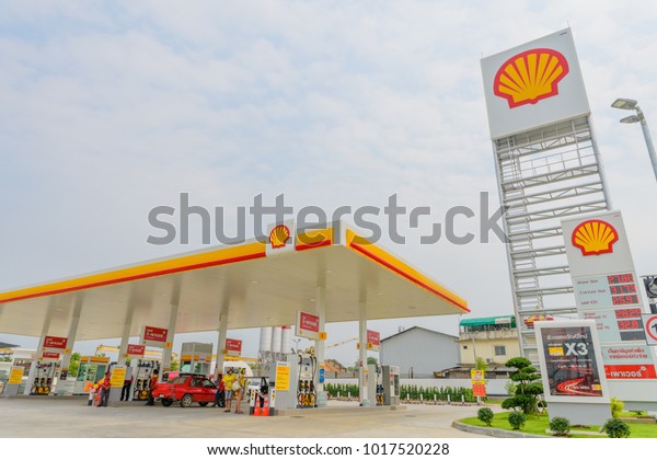 Pattaya, Chonburi, Thailand - Feb 3, 2018: Shell gas\
station blue sky background during sunset. Royal Dutch Shell sold\
its Australian Shell retail operations to Dutch company Vitol in\
2014