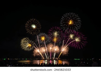 PATTAYA, CHONBURI, THAILAND, Real Fireworks at Pattaya bay, Pattaya national Fireworks Festival contest, November of every Year, Beautiful of bright light fireworks Show in middle sea, for postcard 