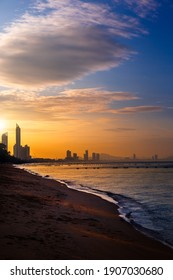 Pattaya City Skyline On The Beach At Sunrise