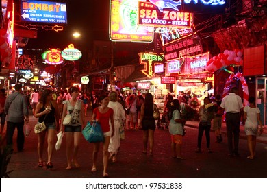 PATTAYA - FEB 14: Crowd Walk Through The  Walking Street To Celebrate Valentin's Day On February 14, 2011 In Pattaya, Thailand. Its A Tourist Attraction Primarily For Night Life And Entertainment