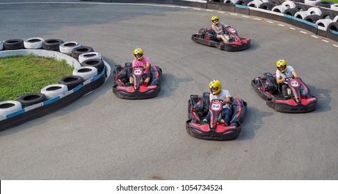 Pattaya, Thailand. 24th March 2018. Friends enjoying go kart racing.
