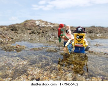 Pattaya, Thailand - 9 July 2020: Lego Spongbob the pirate mini figure looking for the treasure