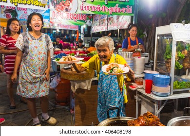 PATTAYA, THAILAND - APRIL 4, 2015; Traders At The Night Market In Thailand