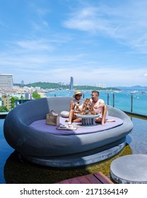 Pattaya Thailand Couple Men And Woman Having Afternoon Tea On A Rooftop Bar In Pattaya Thailand. 