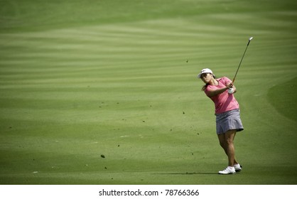PATTAYA, THAILAND - FEBRUARY 18: Jimin Kang of USA ships the ball towards hole 1 during Day 2 of Honda LPGA Thailand 2011 on February 18, 2011 at Siam Country Club Old Course in Pattaya, Thailand
