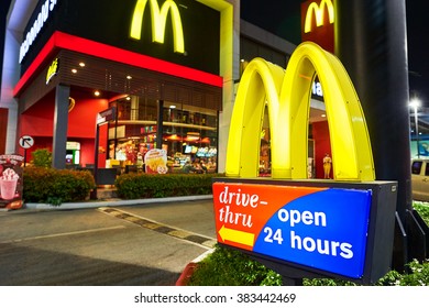 PATTAYA, THAILAND - FEBRUARY 21, 2016: McDonald's restaurant at night. McDonald's primarily sells hamburgers, cheeseburgers, chicken, french fries, breakfast items, soft drinks, milkshakes, desserts